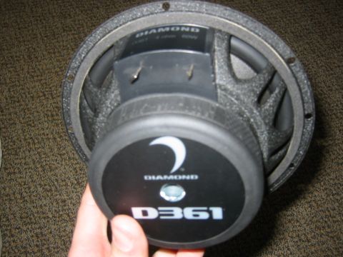 1995 Ford Bronco - Diamond D361 car speaker with "DIAMOND" branding visible on the rear.