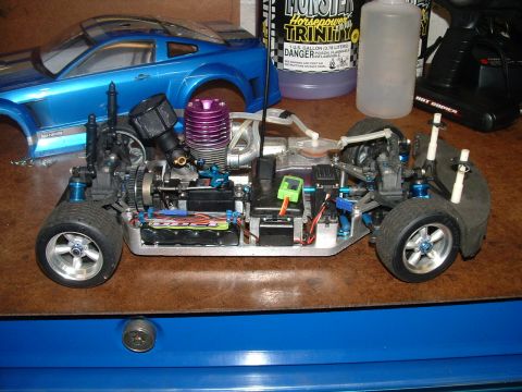 1994 Ford Bronco - A detailed view of a radio-controlled car's chassis, engine, and suspension components.