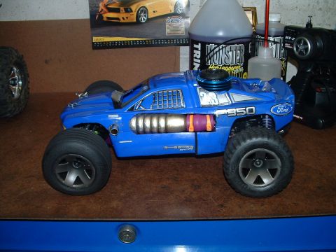 1994 Ford Bronco - This blue RC monster truck has "F350" and Ford branding on its body.