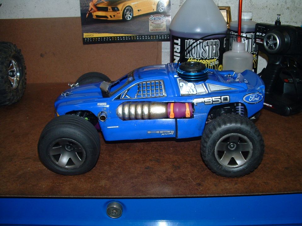 Blue remote control monster truck with "F350" and Ford logos visible