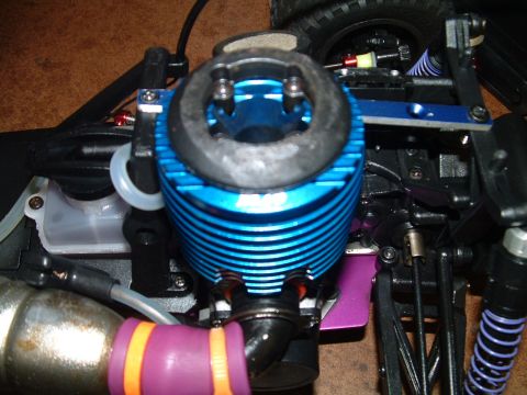 1994 Ford Bronco - Close-up of a model engine with visible exhaust and suspension components.