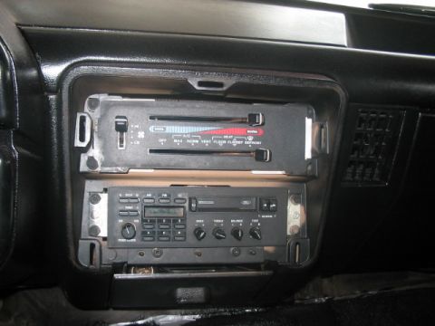 1991 Ford Bronco - The climate controls and radio are visible in this close-up of a vehicle's dashboard.