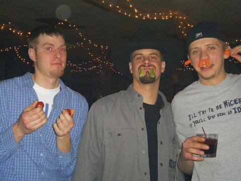 1977 Ford F-150 - Three men pose for a photo with vegetables in their mouths and noses, with one man wearing a cowboy hat.