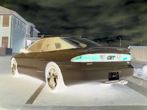1996 Ford Probe - Rear view of a 1996 Ford Probe GT, showing the GT badge and license plate.