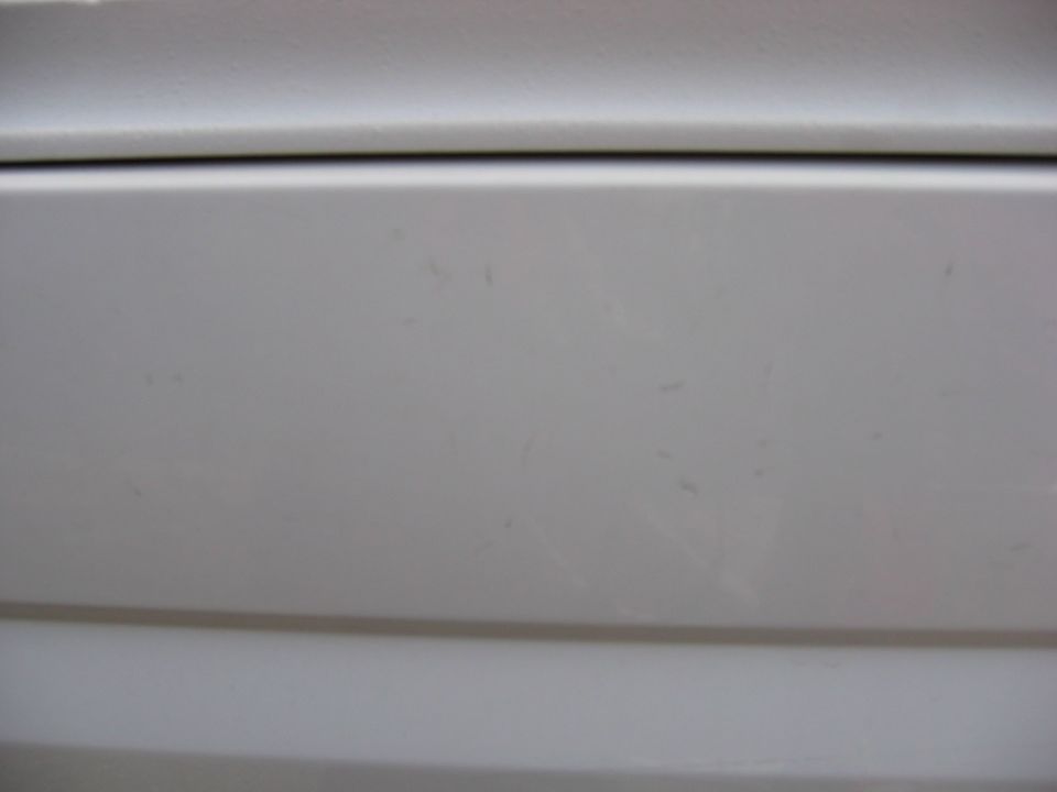 Hard to see, but little scratches from the 1st owner. It said something along the lines of  "Fire Chief"