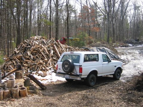 1995 Ford Bronco - next to wood pile 95 F-350 (sand truck) in the background