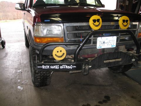 1995 Ford Bronco - Front view of a 1995 Ford Bronco, modified with an aftermarket bumper and auxiliary lights.