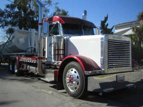 1968 Ford Mustang - This white and red semi-truck is shown from a 3q-front angle. The license plate is visible and reads S042263.