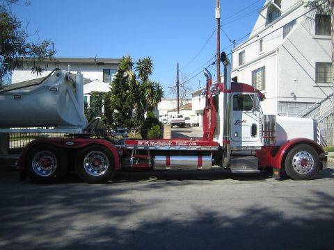 1968 Ford Mustang - Semi-truck with dump trailer, showing website www.davis-truck.com on the frame.