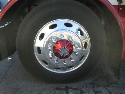 1968 Ford Mustang - Close-up of a large truck's wheel and tire assembly.