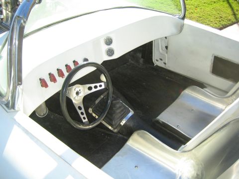 1968 Ford Mustang - Interior view of a custom car with racing seats and a modified dashboard.