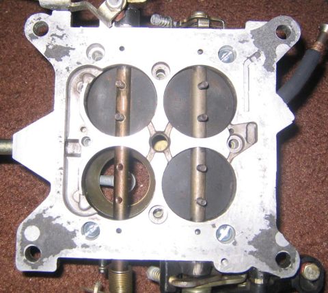 1969 Ford Mustang - Close-up of a Holley 4-barrel carburetor, showing the internal throttle plates.