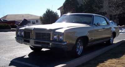 1972 Ford Ranchero - This classic car is parked on a sunny day, showing off its distinctive grille and chrome accents.