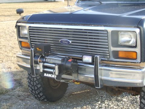 1986 Ford Bronco - My new winch mounted on the front receiver hitch.