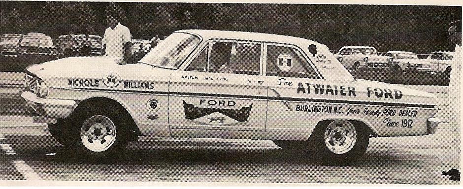 Vintage photo of a white Ford Fairlane drag car wheelstanding with Atwater Ford lettering