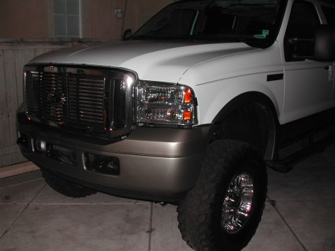 2005 Ford Excursion - New grill, got rid of the all white. Bad pictures, will have to update with better ones in daylight.
