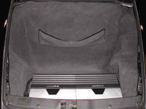 1997 Porsche 911 - Alpine audio amplifier installed in the trunk of a car.