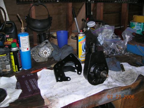 1985 Ford Bronco - new pump and bracket cleaned and painted.