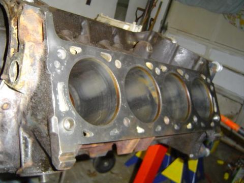 1979 Ford Bronco - Close-up view of an engine block, likely undergoing a rebuild or modification.