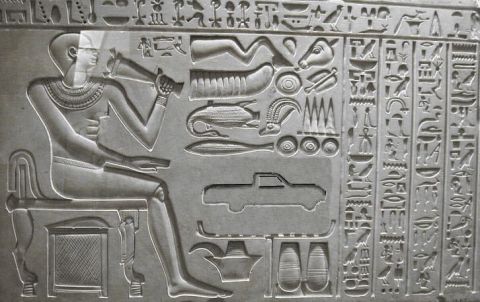 2002 Ford Crown Victoria - Hieroglyphic inscription and relief art from ancient Egypt, including a depiction of a pickup truck.