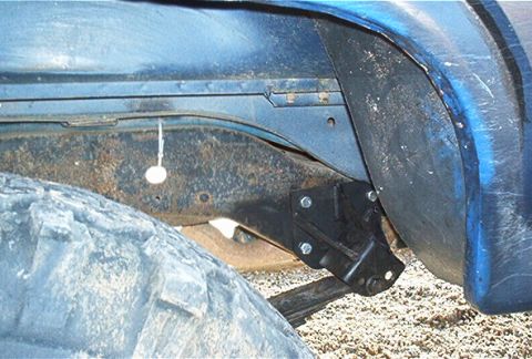 1986 Ford Bronco - I then placed the front hanger. Notice that I had to drill a center hole. The reason for this is that there is not enough clearance for the…