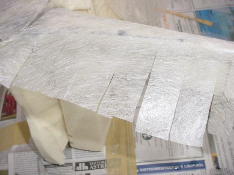 1986 Ford Bronco - When fiberglassing around edges I found helpful to make some cuts to help the mat following the shape.