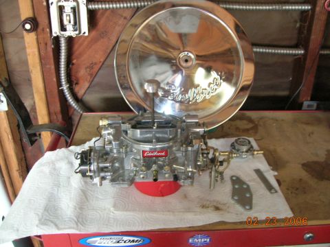 1985 Ford Bronco - carb, air cleaner, fuel regulator and throttle bracket.