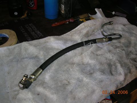 1985 Ford Bronco - custom hose....pump end from 85 E150 van and gear box end of 85 bko...had made by Hose Man.