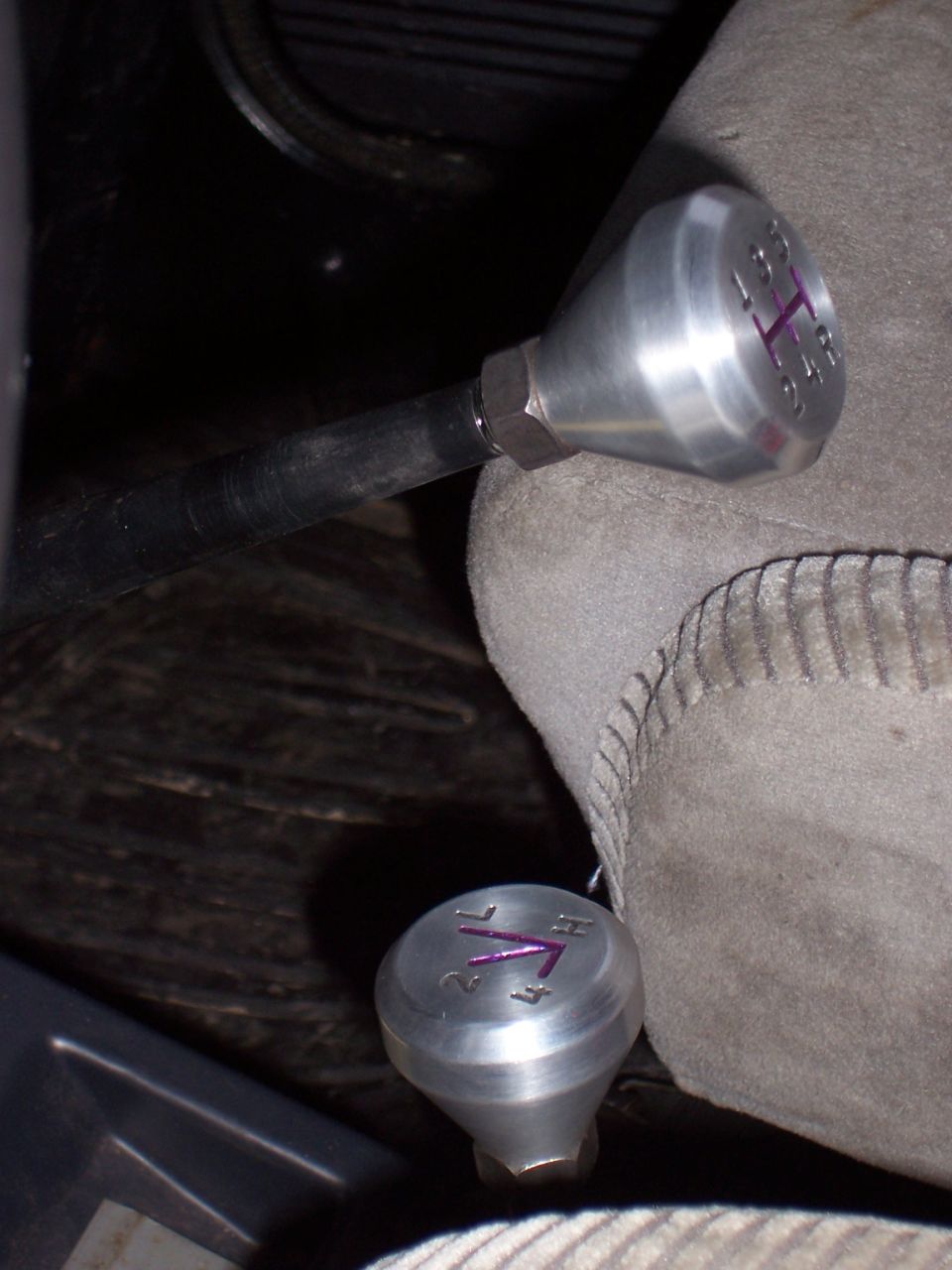 Aluminum shift knob installed on lever and a second transfer knob on truck floor