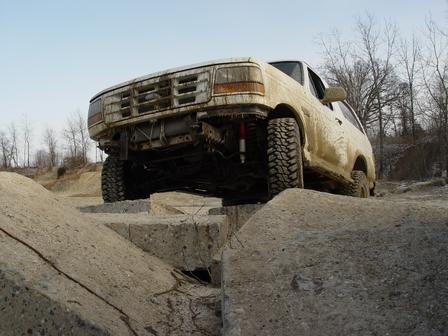 1995 Ford Bronco - This 1995 Ford Bronco is navigating a challenging off-road obstacle course.