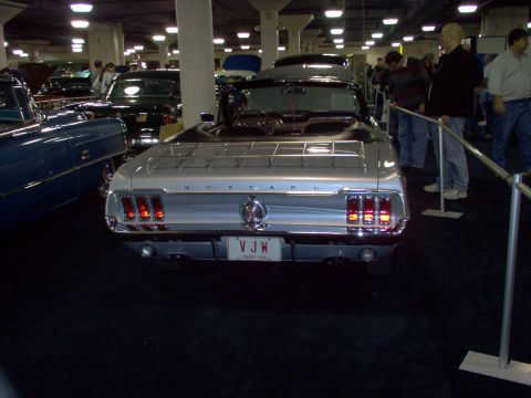 1970 Ford Ranchero - Rear view of a 1969 Ford Mustang convertible at a car show.