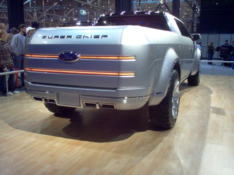 1970 Ford Ranchero - Rear view of the Ford Super Chief concept truck, displayed indoors.