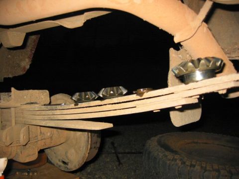 1991 Ford Explorer - Leaf spring assembly detail, showing U-bolts and nuts securing the spring.
