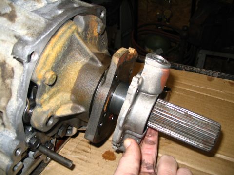 1984 Ford Bronco - Close-up of a transmission output shaft and housing, indicating a mechanical part rather than a complete vehicle.