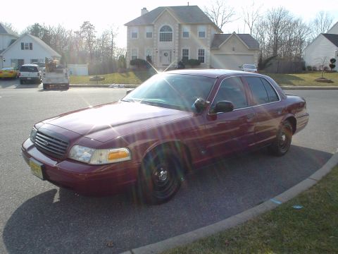 1999 Ford Crown Victoria - Other side. Too Much Sun Glare.