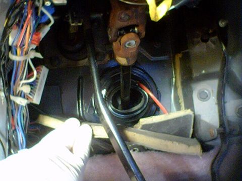 1994 Ford Bronco - Steering column assembly and wiring harness visible inside a vehicle's cabin.