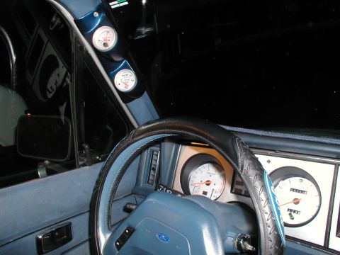 1987 Ford Bronco II - Interior view of a 1987 Ford Bronco II, showing the dashboard, steering wheel, and various gauges.