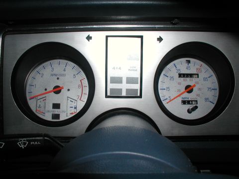 1987 Ford Bronco II - Interior view of the dashboard gauges for a 1987 Ford Bronco II, showing the tachometer and speedometer.