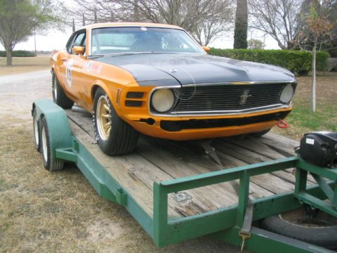 1970 Ford Mustang - fresh paint on the new hood. Check out the green trailer