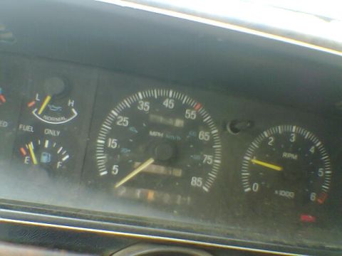 1987 Ford F-250 - Close-up of the instrument cluster showing speed, fuel level, and engine RPM.