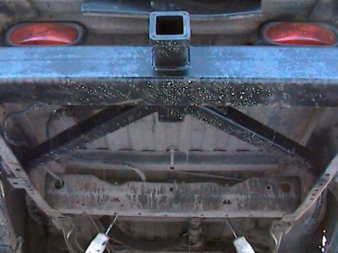 1977 Ford F-150 - Underside view of a 1977 Ford F-150, showing the trailer hitch and rear frame components.