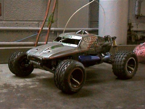1977 Ford F-150 - This remote control buggy has a metallic silver body and off-road tires.