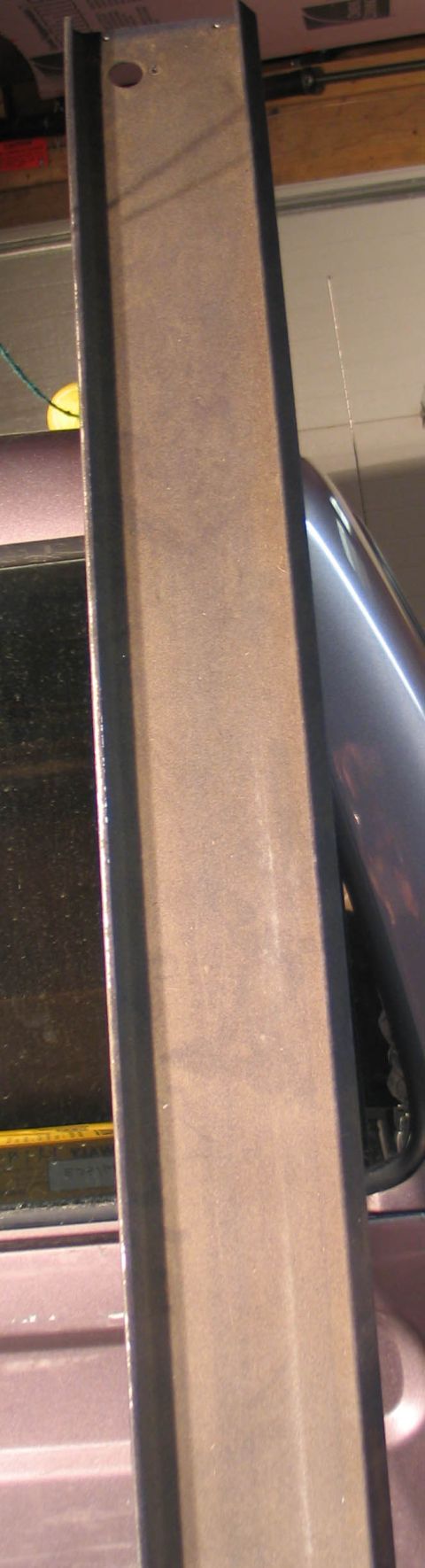 1994 Ford Bronco - This image shows a visor shelf part, likely from a vehicle, with visible text at the bottom.