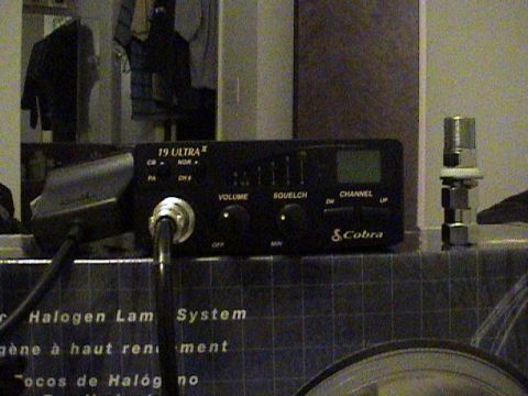 1994 Ford Bronco - A Cobra 19 Ultra II CB radio is visible, along with its microphone and an antenna connector.