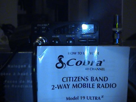 1994 Ford Bronco - A Cobra 19 Ultra 40 channel citizens band 2-way mobile radio is shown with its instruction manual.