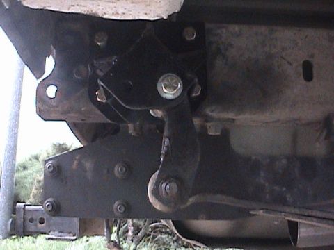 1994 Ford Bronco - This photo shows a close-up view of a vehicle's suspension component, possibly a shackle flip bracket.