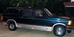 1995 Ford C-150 (Centurion Conversions) - Side view of a 1995 Ford C-150 Centurion conversion van.