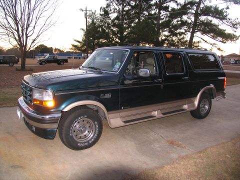 1995 Ford C-150 (Centurion Conversions) - This 1995 Ford C-150 Centurion Conversions SUV is seen from the front three-quarter angle.