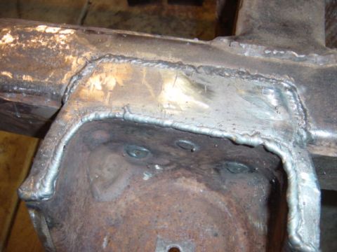 1967 Ford Bronco - This photo shows a close-up of a welded section of a vehicle's frame, indicating repair or modification.