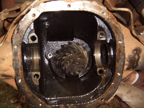 1988 Ford Bronco - Close-up view of the differential gears within the housing, indicating mechanical components.